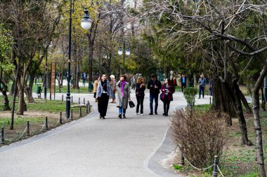 People and tourists wander the streets of the Bucharest Old Town, Romania, 2022