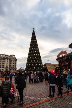 People at Bucharest Christmas Market in downtown Bucharest, Romania, 2022