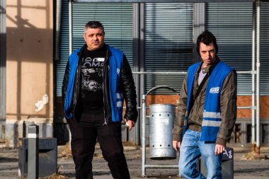 People and tourists wander the streets of the Bucharest Old Town, Romania, 2022