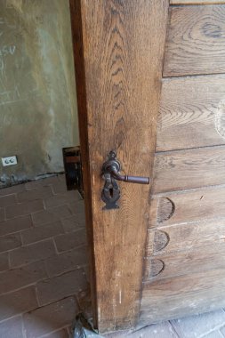 Old medieval castle wooden door
