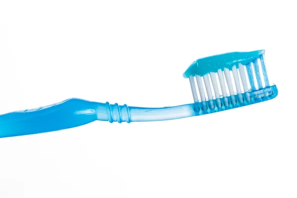 One toothbrush with toothpaste over white background — Stock Photo, Image