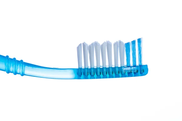 Uno spazzolino da denti su sfondo bianco — Foto Stock