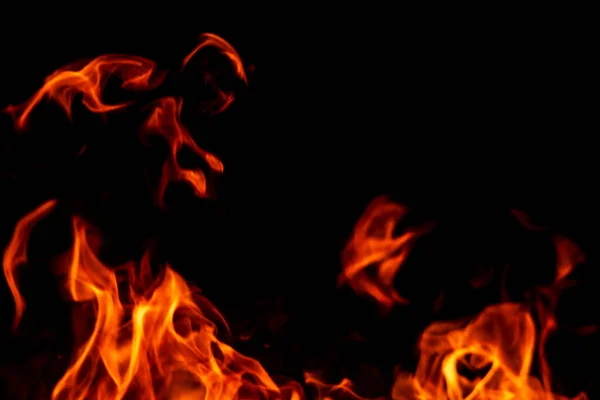 Fiamma astratta, struttura della fiamma di fuoco, sfondo. Lingue di fuoco su sfondo scuro. — Foto Stock