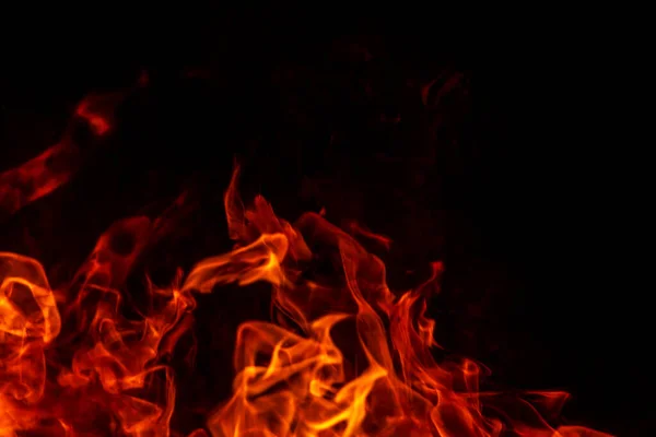 Abstract flame, fire flame texture, background. Tongues of fire on a dark background. — Stock Photo, Image