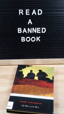 A copy of John Steinbeck's Of Mice and Men, a book found on some schools' banned book lists.                         