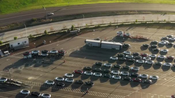 4K aerial of loading dock at parking lot electric vehicles factory, eco-friendly — Stock Video