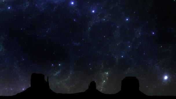 Incroyable laps de temps Voie lactée et Galaxies dans le ciel nocturne au-dessus de Monument Valley — Video