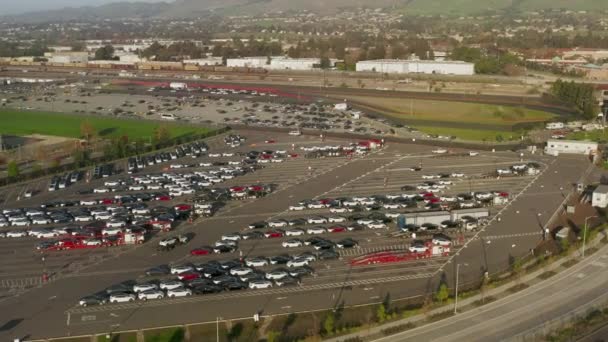 4K drone aerial parking lot brand new Tesla electric cars ready for delivery — Stockvideo