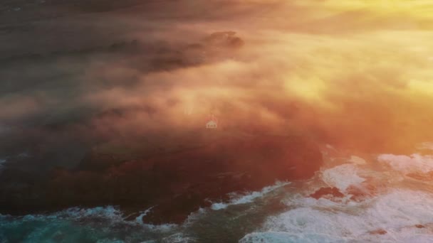Drone soaring above beautiful ocean waves at magical golden orange sunrise — Video Stock