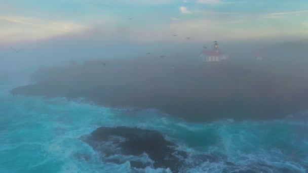 Cinematic lighthouse illuminating morning fog, Point Cabrillo Lighthouse, USA — Stockvideo
