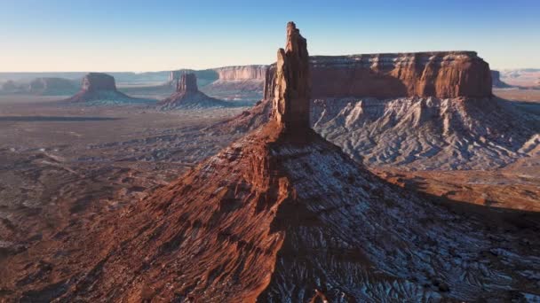 Cinematic red desert landscape with high rocky tower of sandstone cliff Aerial — Stok Video