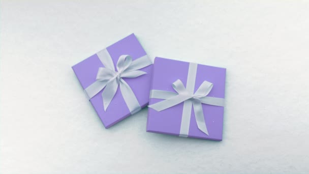 Top down view on pastel lilac purple gift boxes for Valentines Day or Birthday — Stock Video