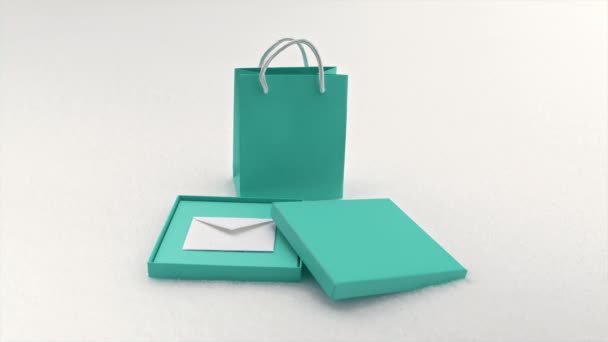 Elegantes Geschenkset Pastellgrün mit hochwertiger Papiertüte, Geschenkbox — Stockvideo