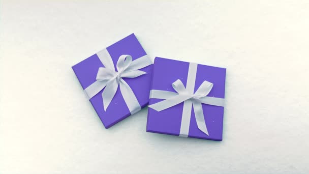 Elegant gift box in pastel purple color with white satin ribbons and simple bows — Stock Video