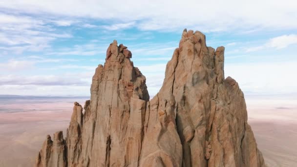 Aerial view over massive rocky Shiprock formation with a sharp peak — Stock Video