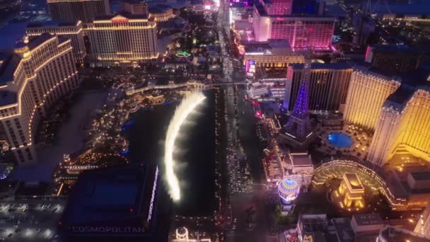 Las Vegas Strip aerial 4K night full of neon lights and nightlife entertainment — стоковое видео