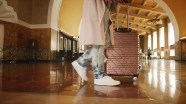 Close up slow motion shot women legs in white shoes walking with suitcase, RED — Stock Video