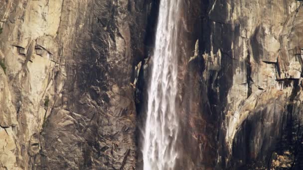 Bridalveil Fall in Yosemite National Park, slow motion waterfall falling down 6K — Stockvideo