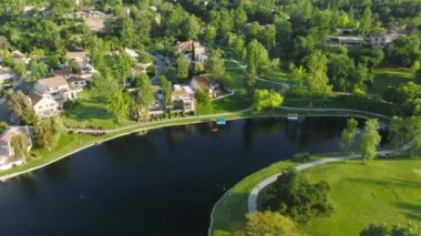 Aerial view of wealthy retreat and residential area within the lush green forest