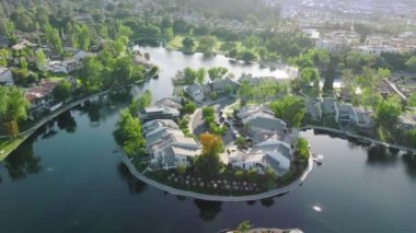 Modern design of luxury living property within hilly landscape and lush greenery