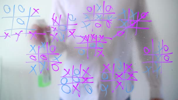 Caucasian Guy Erasing Symbols Liquid Guy Removes Tic Tac Toe — Stock Video