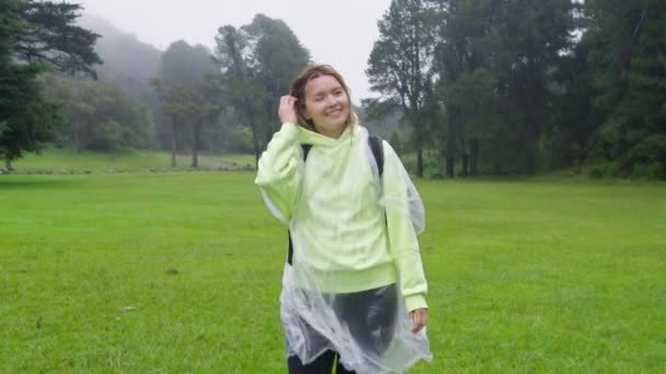 Happy Woman Smiles Tropical Rain Free Carefree Woman Raised Arms — Video