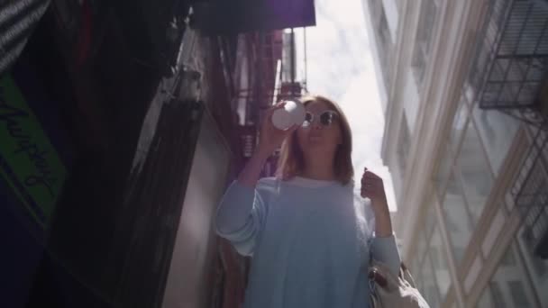 Young Smiling Woman Having Slow Walk Downtown Enjoying Cup Tasty — Wideo stockowe