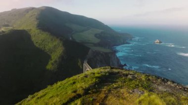 Aerial view of iconic travel destination for a weekend trip and fantasy vacation. American National Scenic Byway along Big Sur coast within unique natural wilderness. High quality 4k footage