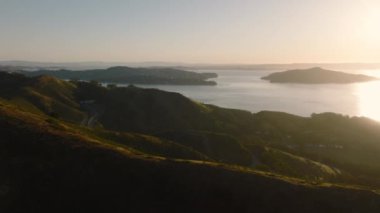 Aerial footage of tranquil seascape with sunrise skyline above. Astonishing landscape of San Francisco Bay Area, California, USA. High quality 4k footage