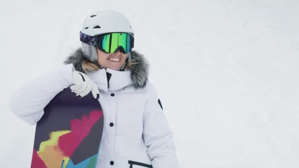 Happy Young Woman Stylish Sportswear White Helmet Colorful Goggles Snowboard — ストック動画