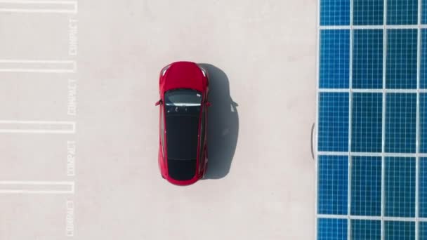 Aerial view red electric car parking under solar panels. Zero pollution car, 4K green energy concept on modern rooftop parking lot. Alternative energy for ecological cars under blue solar batteries