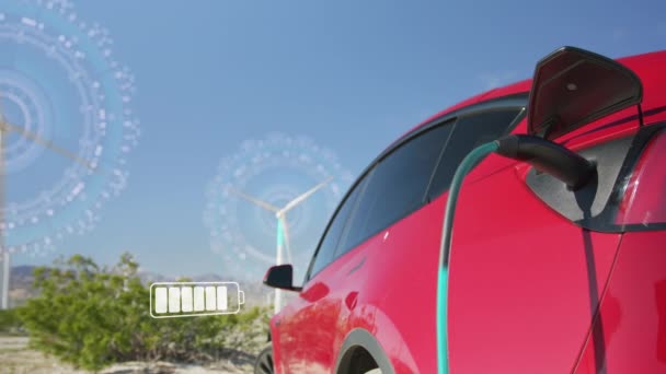 Red Generic Electric Car Charging Rotating Wind Turbines Background Green — Vídeo de Stock