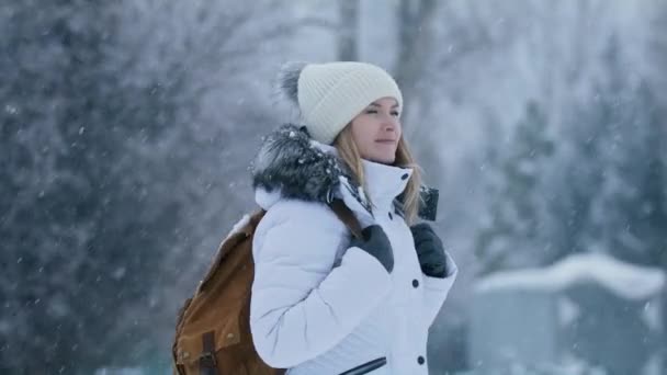 Cheerful Traveler Woman Walking Snowy Winter Forest Slow Motion Smiling — Stok video