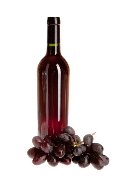 Bottle of wine and grapes on white background — Stock Photo, Image