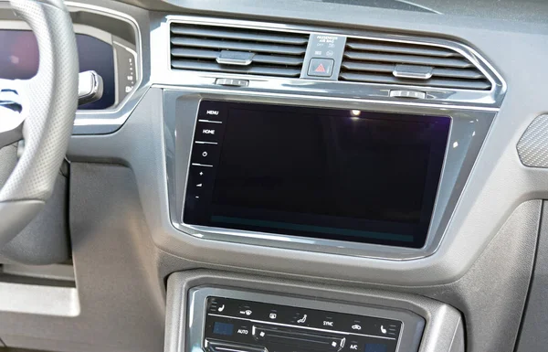 Screen multimedia system on dashboard in a modern car