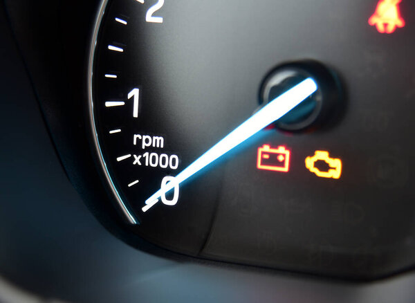 Car Tachometer photographed in a car that stands