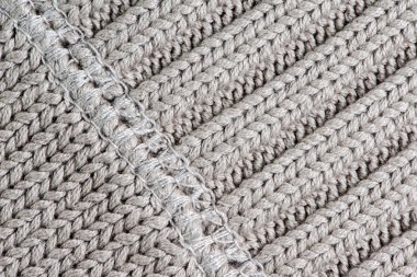 Beyaz doku arka dikiş ile yün örgü.