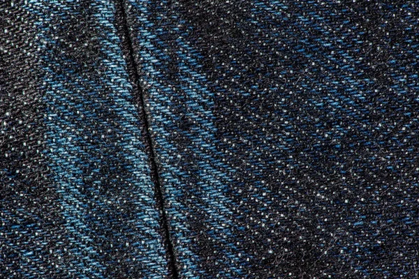 Джинсы в голубой джинсе с текстурой шва . — стоковое фото