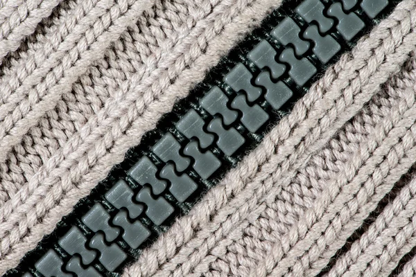 Beyaz örgü yün fermuar doku kökenli.