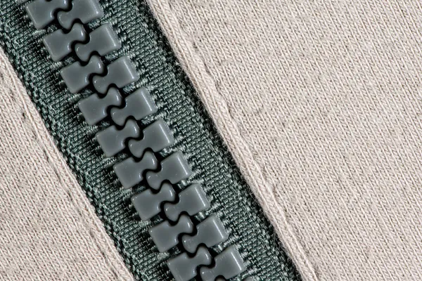 Beyaz örgü yün fermuar doku kökenli.