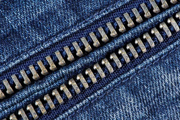 Jeans blu denim con zip texture sfondo . Foto Stock