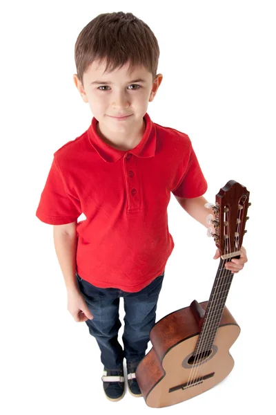 Wide angle shot of a little guitarist — Stock Photo, Image