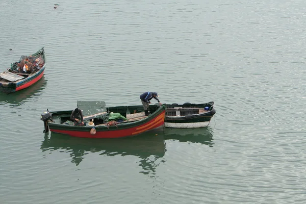 Fisher works from boat