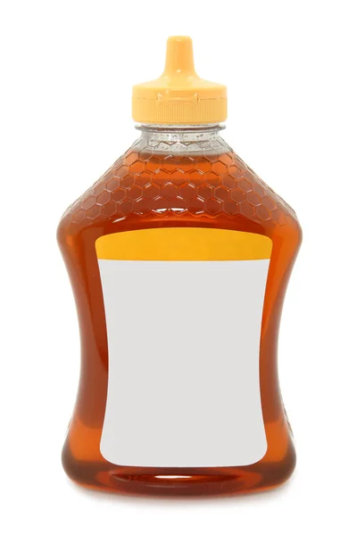Пляшка ізольованих меду Ліцензійні Стокові Фото