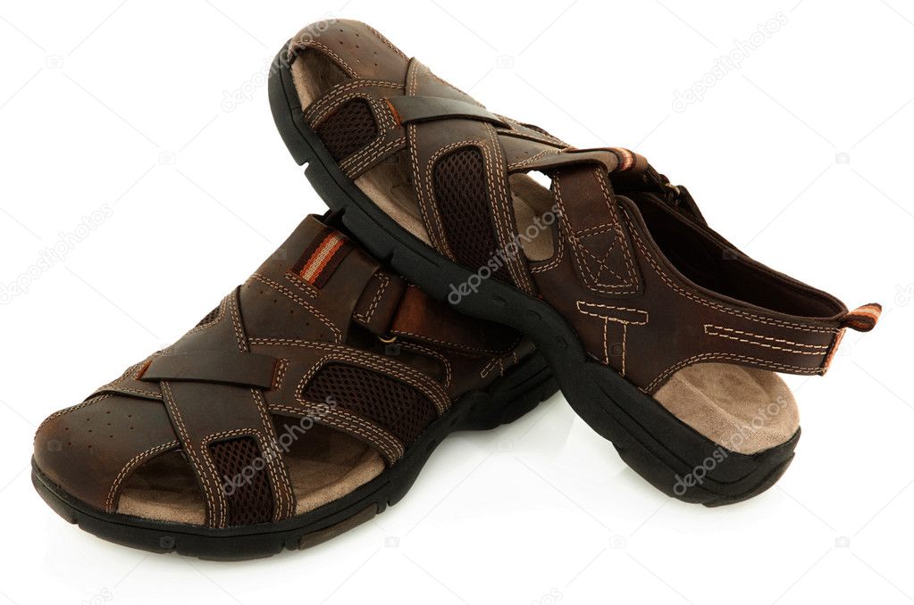 Brown Leather Sandals Over White Background
