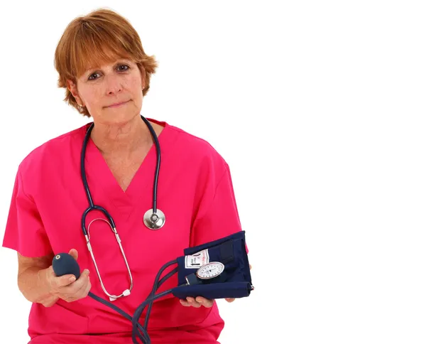 Krankenschwester mit Blutdruckmessgerät — Stockfoto