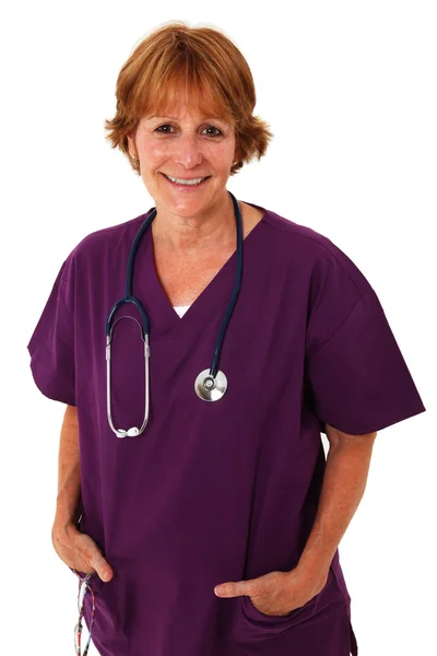 Verpleegkundige glimlachen op camera — Stockfoto