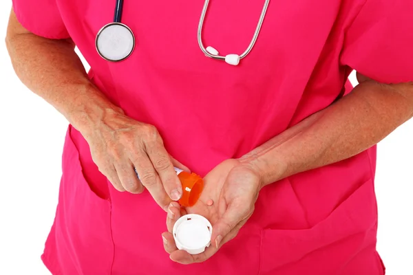 Doctor Dispensing Pills — Stock Photo, Image