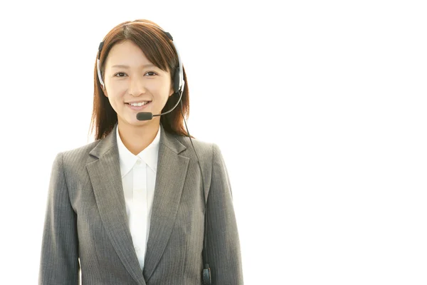 Smiling call center operator — Stock Photo, Image