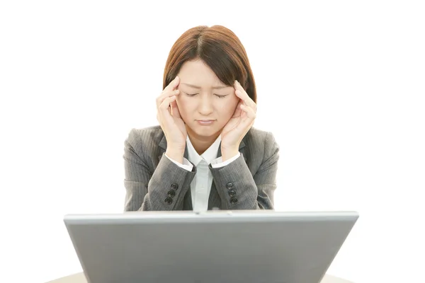 Business woman with headache — Stock Photo, Image